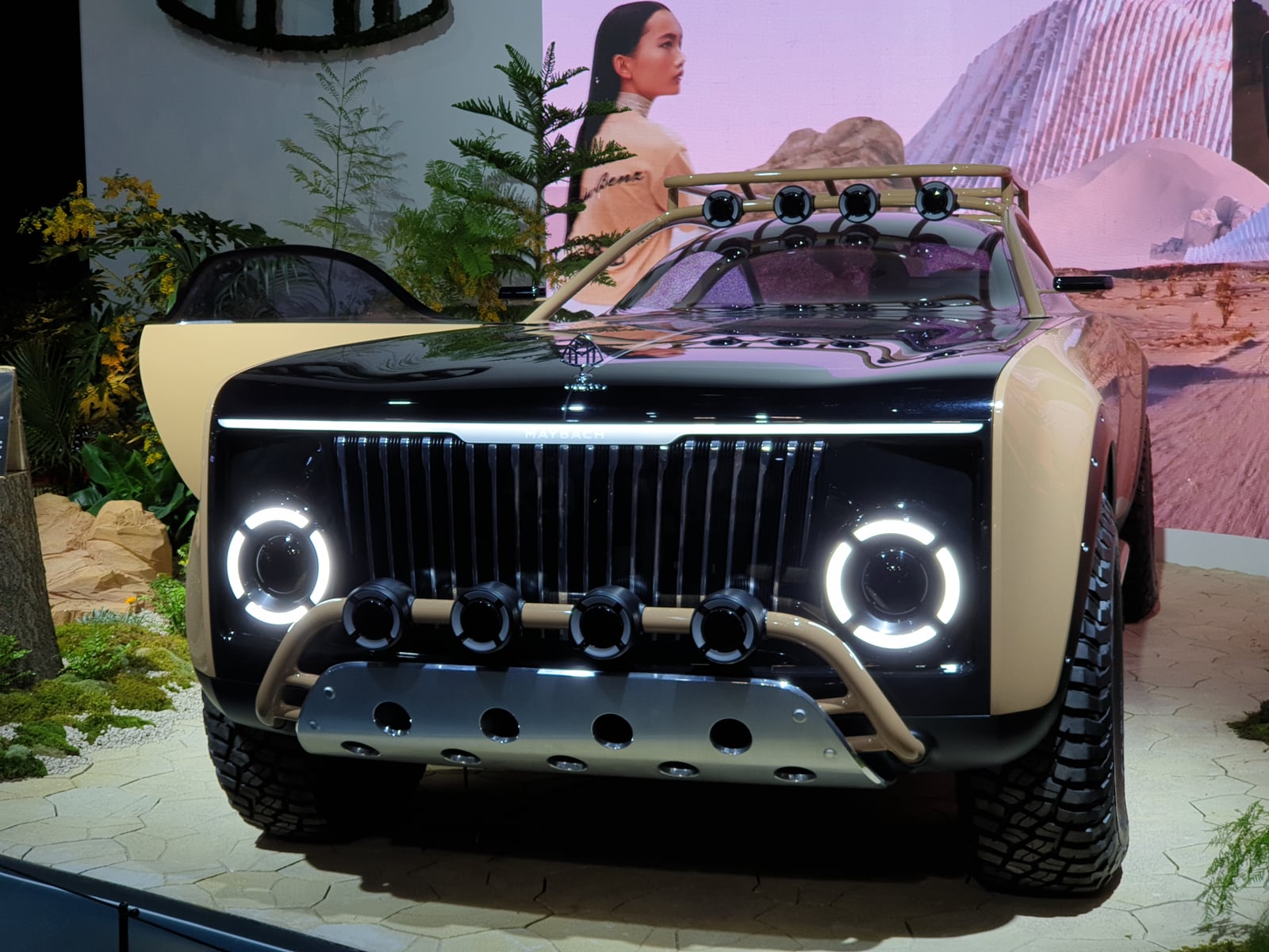 Mercedes-Maybach Project MAYBACH concept, a black-and-beige electric off-road coupe with roof light bar and brush guard, front three-quarter view